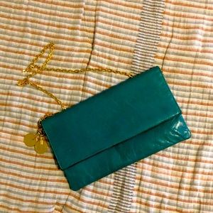 Vintage Pomodoro leather flap bag with clasp and gold chain